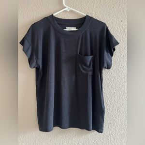 Madewell black polyester tee with pocket. Super cute ribbed small
